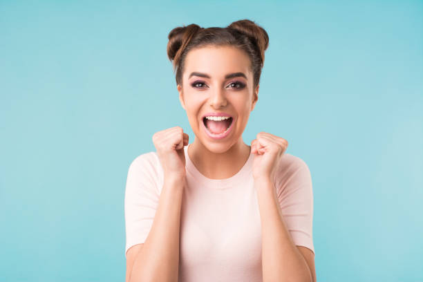 istock beautiful brunette smiles 1152744222