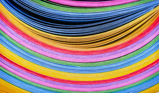 istock Texture layers of colorful multicolored paper  in line curve patterns background 1152744969