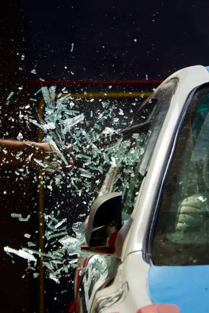 Smashed Vehicle Glass through Vandalism