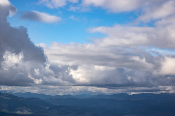 istock Cumulus over the mountains 1152754844