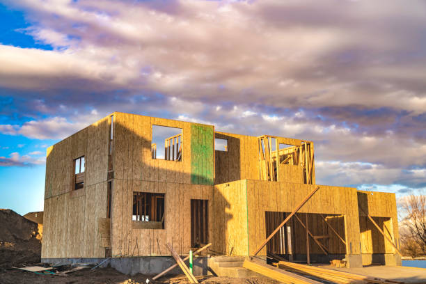 istock Framework of an unfinished house with no roof at a construction site 1152757162