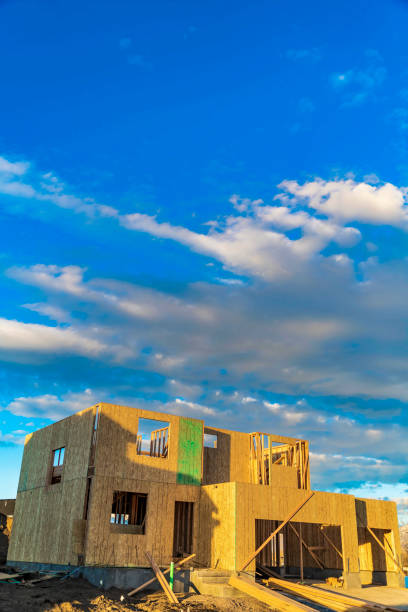 istock Framework of a house under construction viewed on a bright sunny day 1152757163