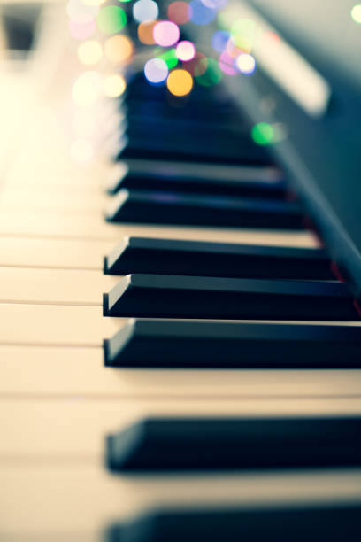 istock piano keys and playing piano 1152757701