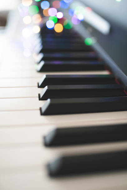 istock piano keys and playing piano 1152757850