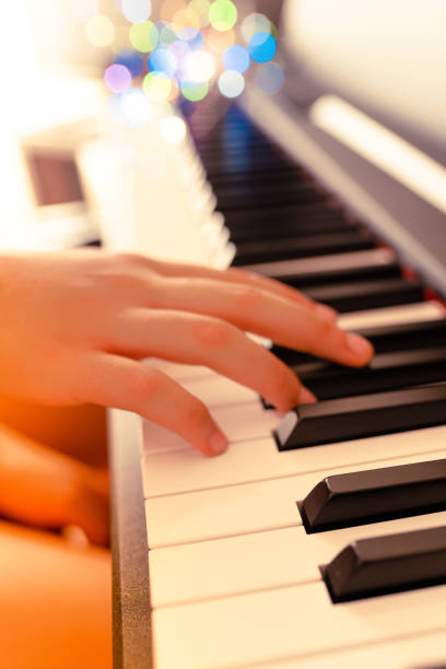 istock piano keys and playing piano 1152758617