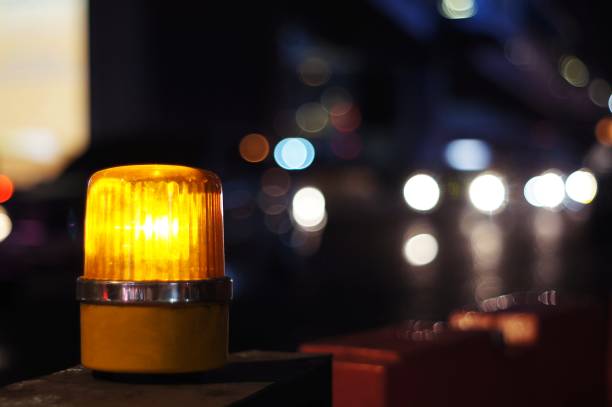 istock Yellow orange siren light rotary warning light in construction side safety sign, installed beside road 1152759960