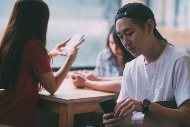 istock Group of Asian young people using smart phone 1152765075