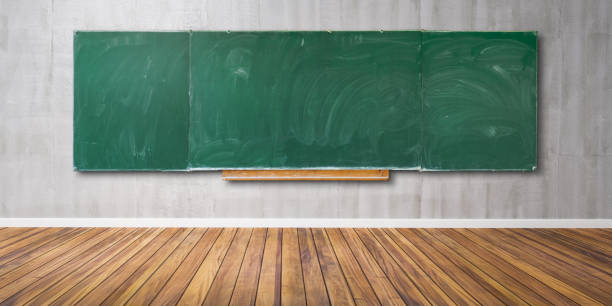 istock Blank green chalkboard, blackboard texture with copy space hangs on gray grunge wall and wooden floor 3D-Illustration 1152765184
