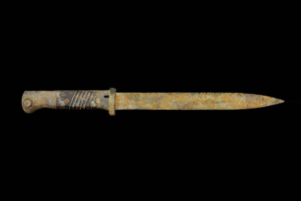 very old and rusty military knife isolated on black background - dagger military isolated bayonet imagens e fotografias de stock