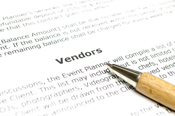 istock Vendors document with wooden pen 1152767673