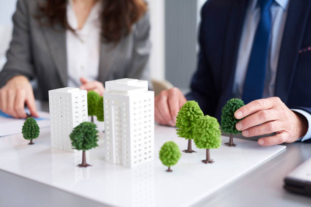 Shot of architectural model on the table in the office Shot of architectural model on the table in the office architectural model stock pictures, royalty-free photos & images
