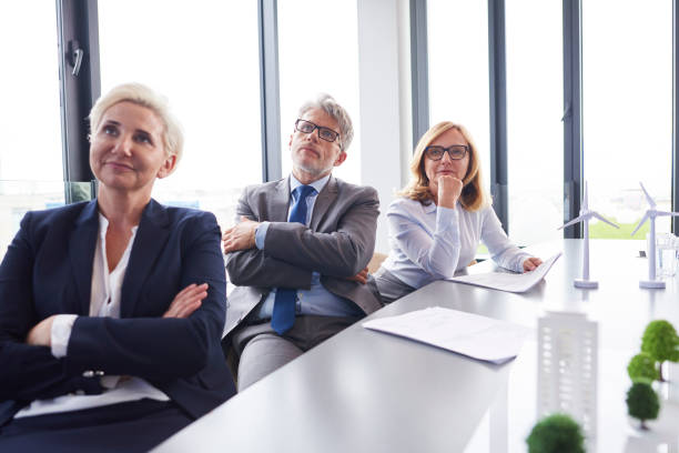 istock Professional coworkers watching video conference 1152770270
