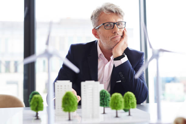 istock Portrait of tired businessman at work 1152770302