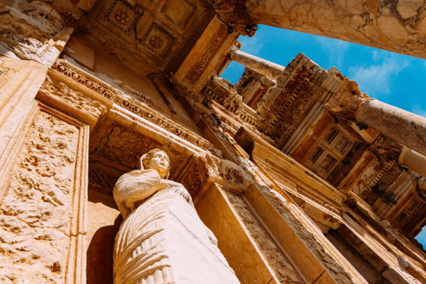Statue on the Front of Celsus Library Statue on the Front of Celsus Library at Ephesus celsus library photos stock pictures, royalty-free photos & images