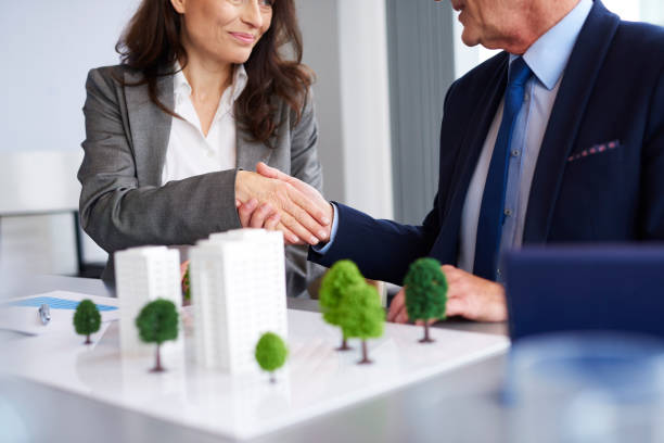 istock Close up of business partners shaking hands 1152771765