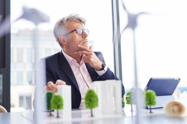 istock Busy businessman thinking about new solutions 1152772528