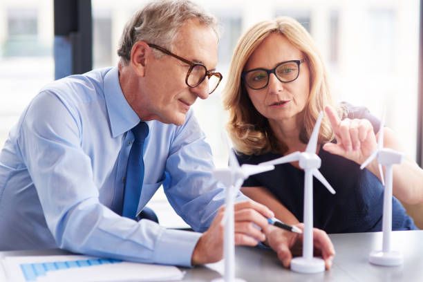 istock Business couple having consultations about wind energy 1152773291