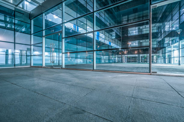 istock empty brick road nearby office building, china 1152775675