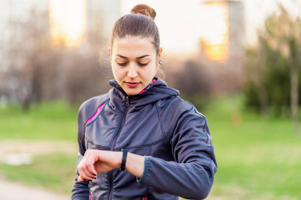 istock Sportswoman checking her smart watch 1152777081