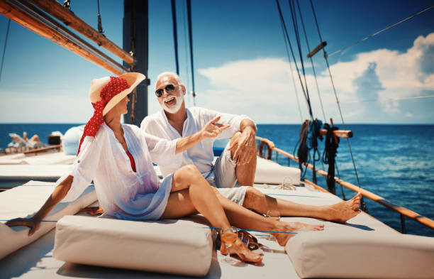 Senior couple on a sailing cruise.