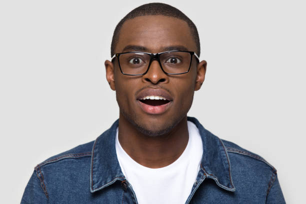 istock Amazed african man wearing glasses looking at camera 1152782366