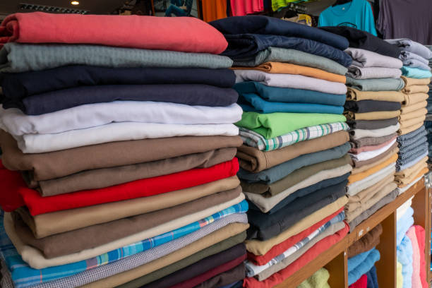 istock Clothes that are arranged on shelves and hangers. 1152794818