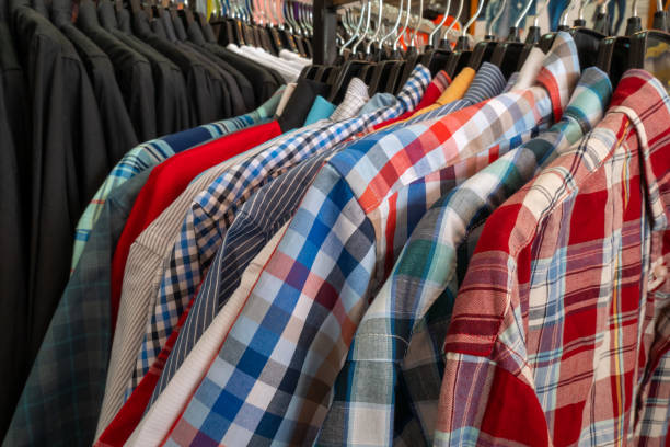 istock Clothes that are arranged on shelves and hangers. 1152794822