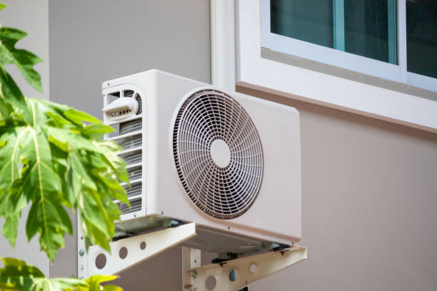 istock Air conditioner compressor outdoor unit installed outside the house 1152796569