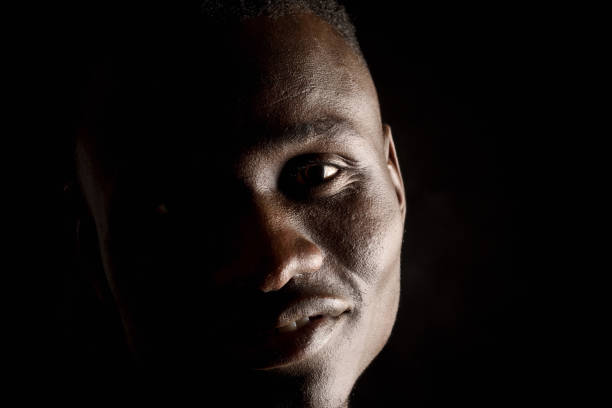istock dark portrait of an african man 1152801477