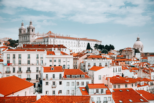 Alfama district in Lisbon. National Pantheon (The Church of Santa Engrcia ) and The Church or Monastery of So Vicente de Fora on the background.