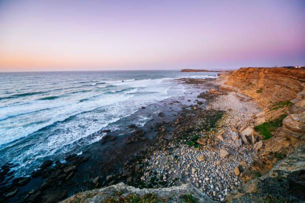 istock Sunset in Peniche. Rocky cliffs and the ocean. 1152802237