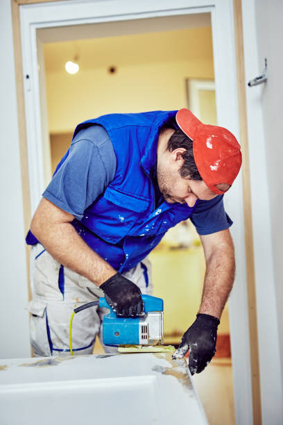 istock Handyman fixing / working on a house renovation. 1152805366