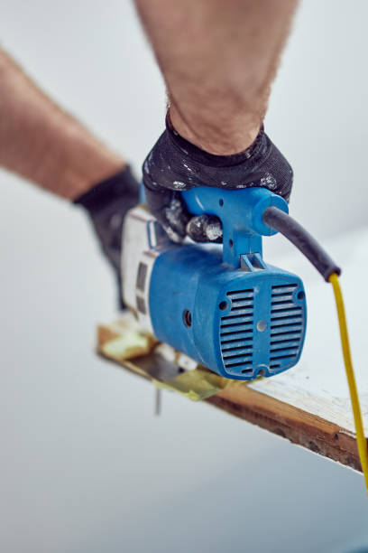 istock Handyman fixing / working on a house renovation. 1152805481