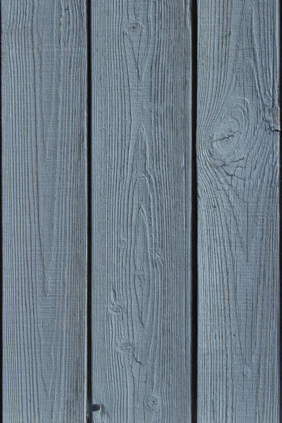 istock Vertical wooden boards painted with light paint. Painted wood texture background 1152808375