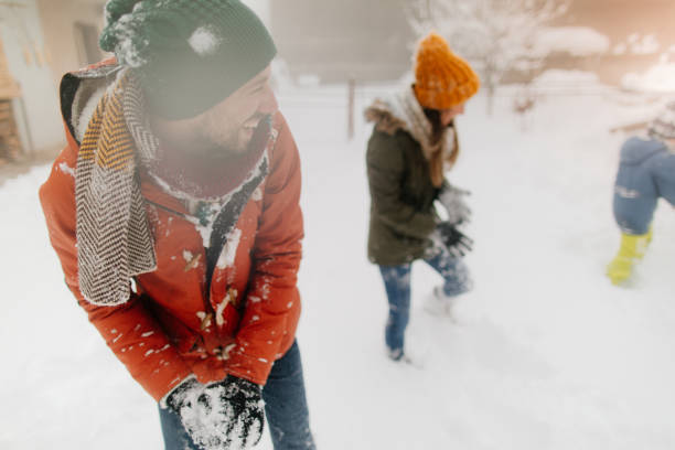 Couple snow fighting