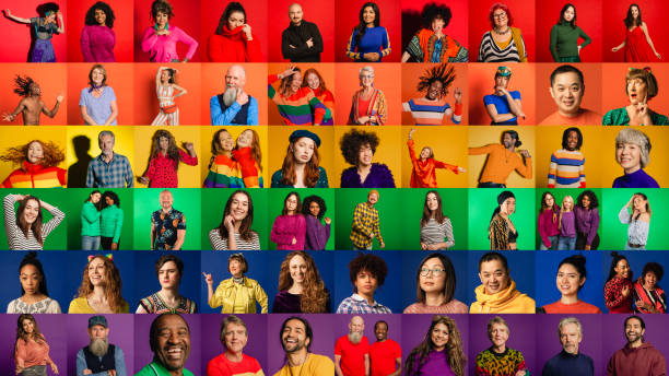 A montage of a large group of individual portraits together to form a pride flag that represents a multi-ethnic, mixed age range group.