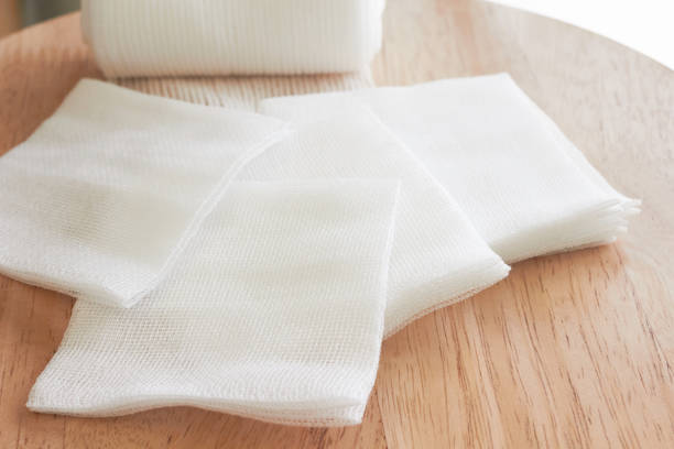 istock Gauzes and roll gauze on wooden table 1152810177
