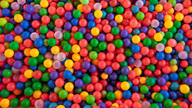 istock Colorful plastic balls on children's playground, multi colored balls as background and texture. 1152810267