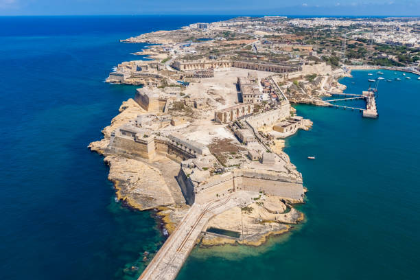 Fort Ricasoli aerial view. Island of Malta from above. Bastioned fort built by the Order of Saint John in Kalkara, Malta. Gallows' Point, north shore of Rinella Bay, entrance to the Grand Harbour stock photo