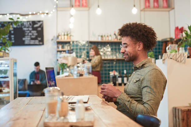 istock Coffee shop client enjoying a cup of cafe macchiato. 1152811979