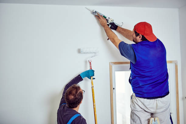 istock Two handymen working together on a house renovation. 1152812336