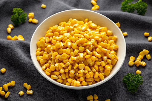 Sweet Corn in white bowl. Healthy food.