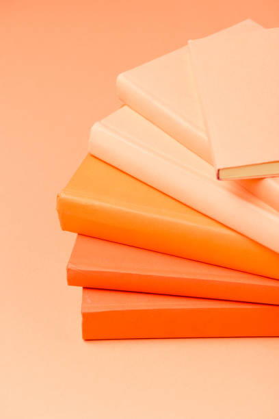 istock stack of colorful hardcover books on light surface 1152821125