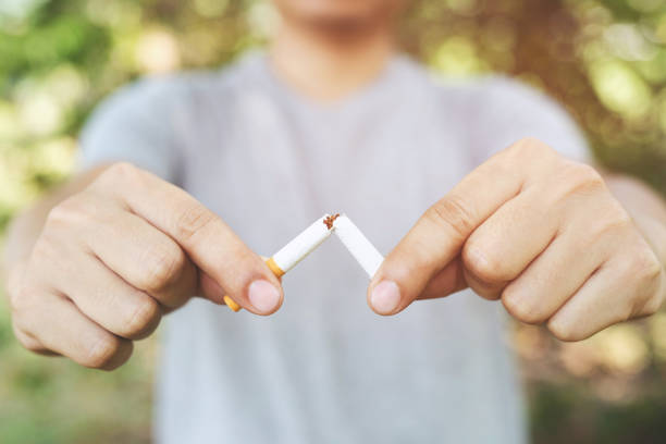 istock Man refusing cigarettes concept for quitting smoking and healthy lifestyle.or No smoking campaign Concept. 1152822544