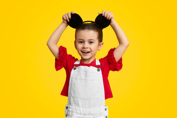 Cheerful girl with mouse ears