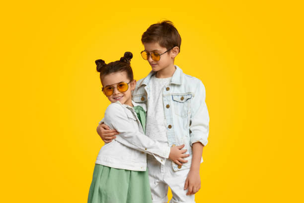 istock Stylish kids smiling and hugging 1152823471