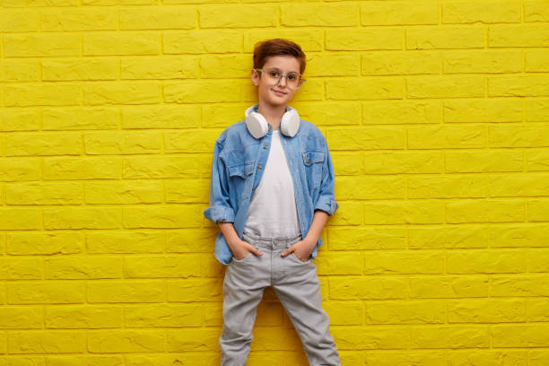 istock Trendy youngster leaning on wall 1152823498