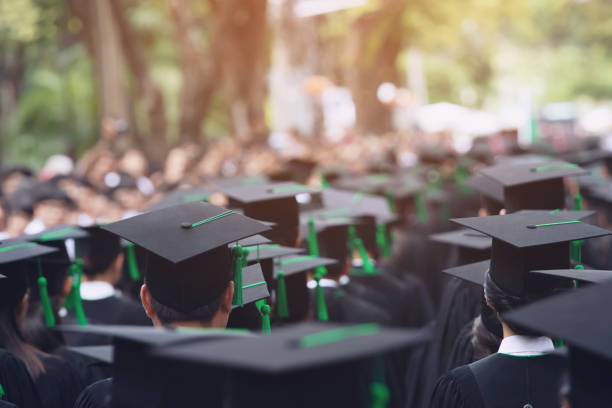 istock Group of Graduates during commencement. Concept education congratulation in University. Graduation Ceremony 1152824867