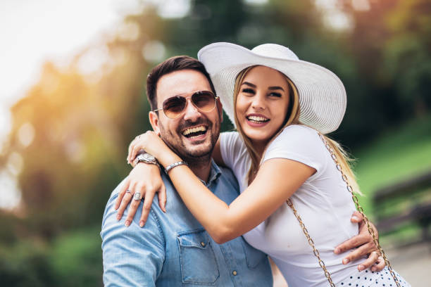istock Romantic young couple having fun in the park. 1152826562