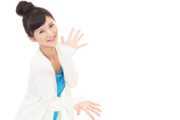 Lovely petite woman in her early 20s gives you a look of pure happiness.